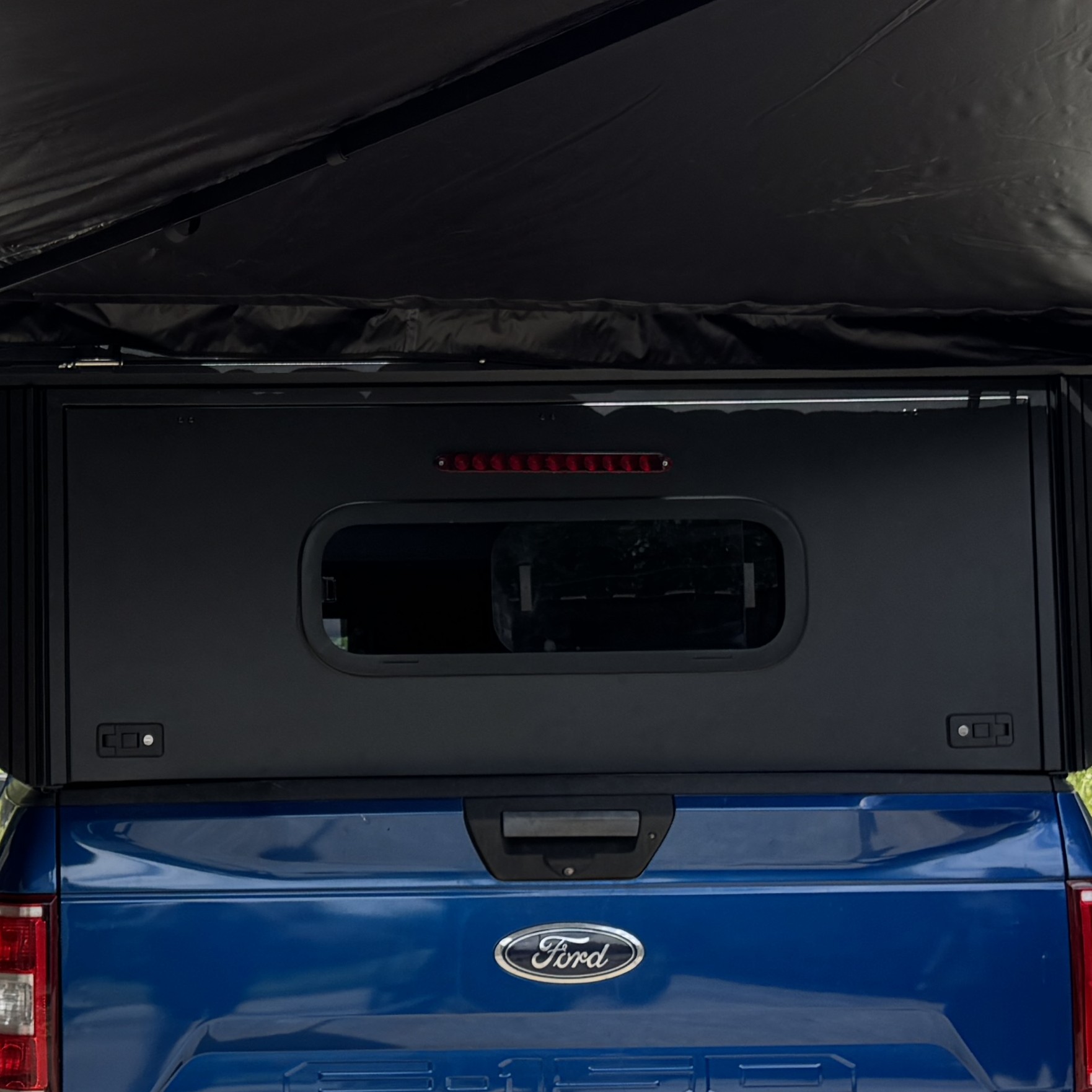 Standard rear hatch on a Summit camper