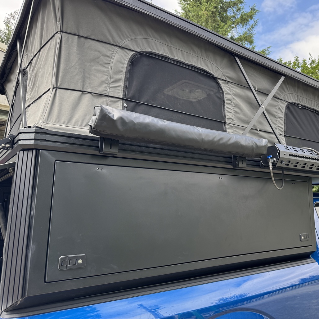 Standard gull-wing side hatch on a Summit camper